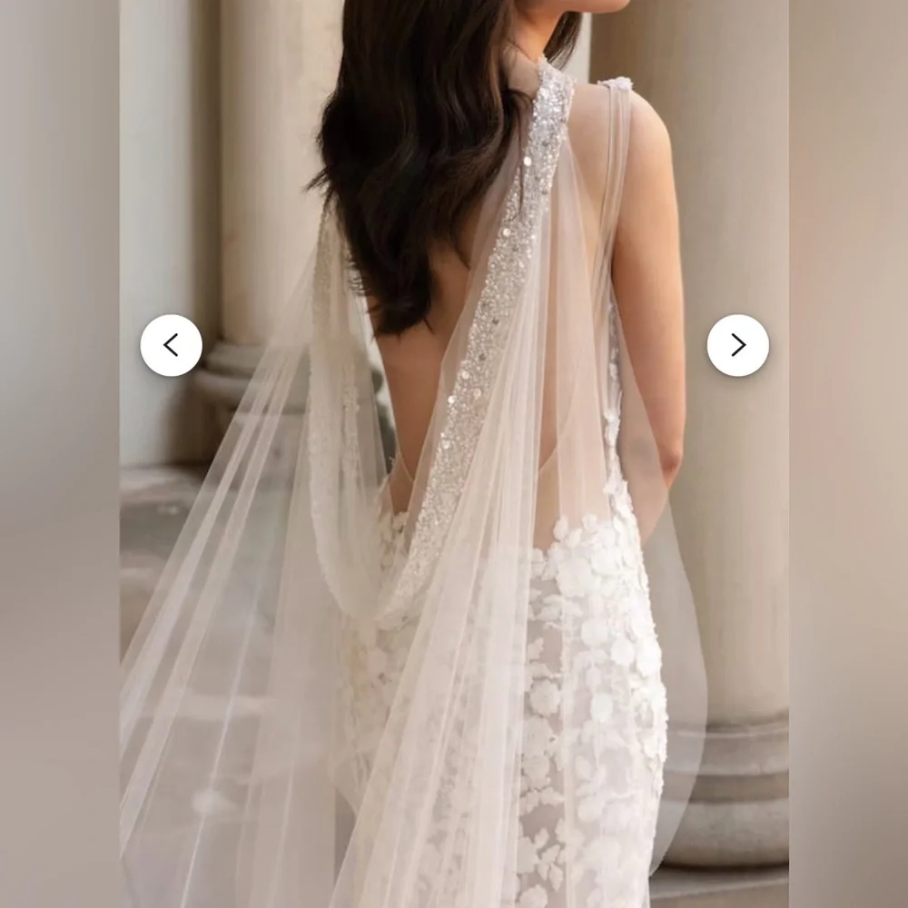 Elegant Ivory Beaded Bridal Cape with Floral Details - Picture 1 of 9